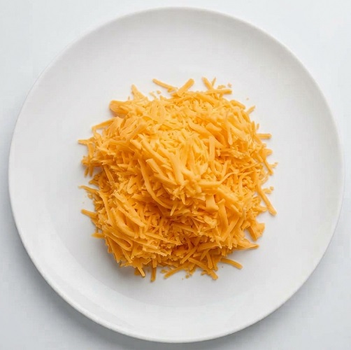 Portion Of Cheddar Cheese 
